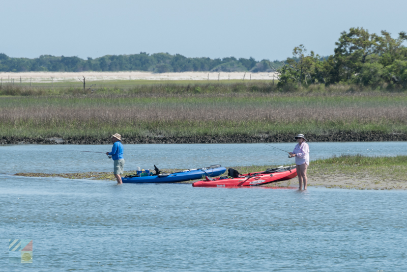 Kayakers fish from  Sugarloaf Island