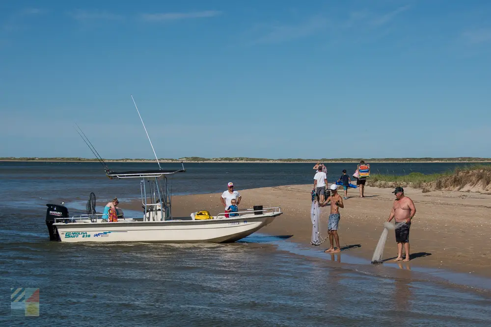 A private boat lands on Cape Lookout National Seashore